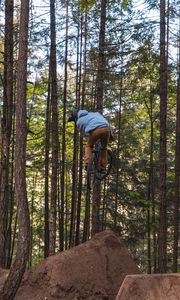 Preview wallpaper cyclist, bike, jump, trick, forest