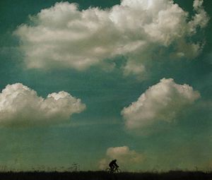 Preview wallpaper cyclist, silhouette, clouds, sky