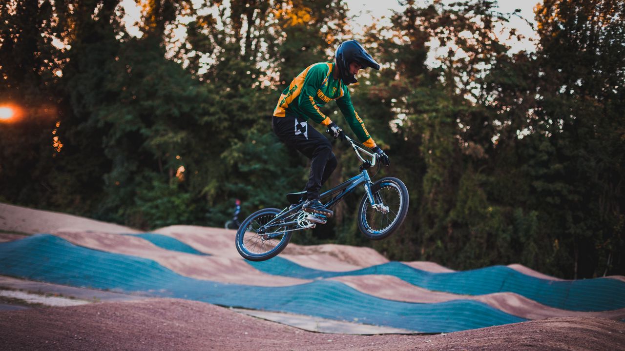 Wallpaper cyclist, stunt, jump, helmet, cycle track