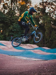 Preview wallpaper cyclist, stunt, jump, helmet, cycle track