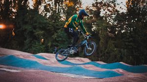 Preview wallpaper cyclist, stunt, jump, helmet, cycle track