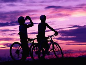 Preview wallpaper cyclists, leisure, sport, sunset