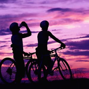 Preview wallpaper cyclists, leisure, sport, sunset
