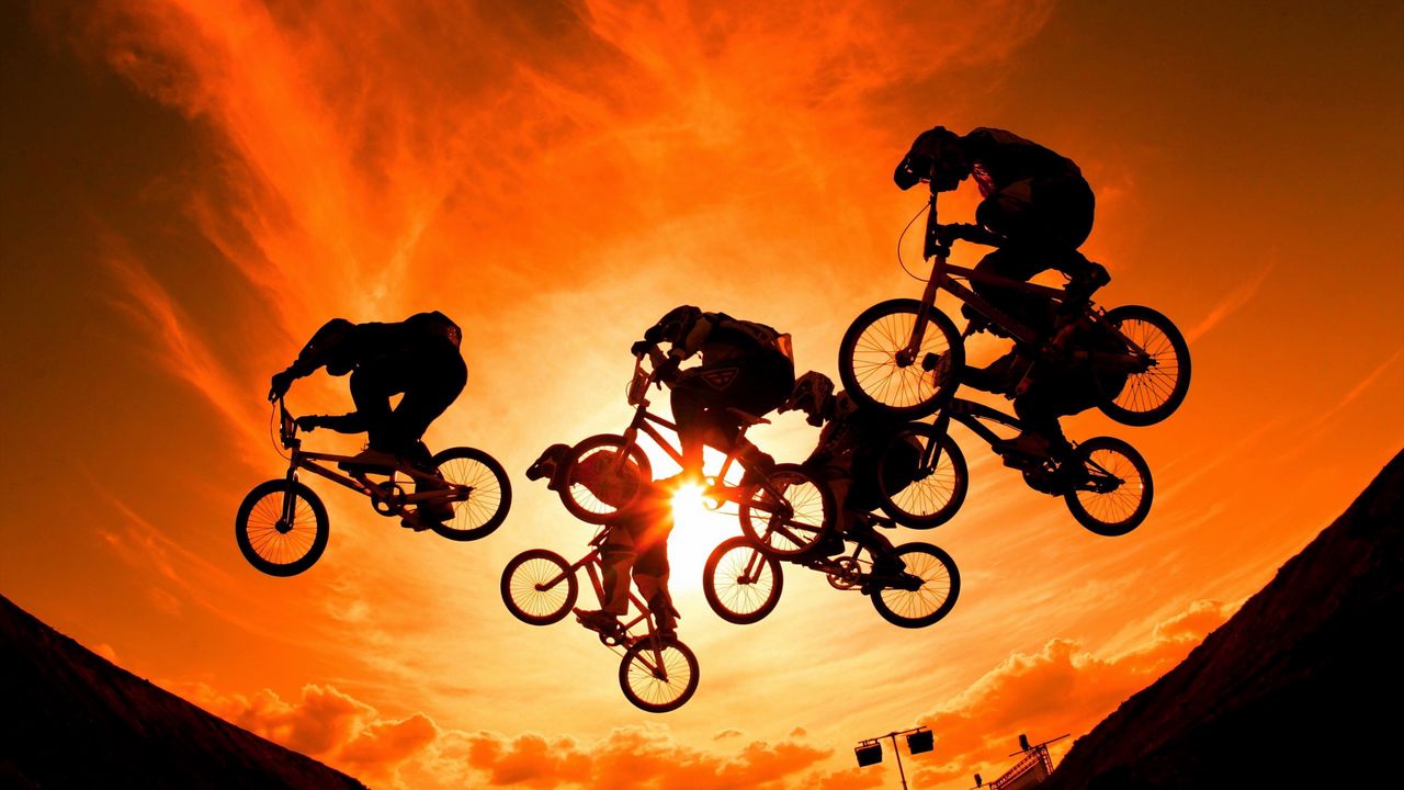 Wallpaper cyclists, sun, sky, sunset