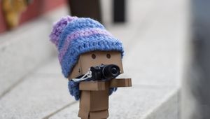 Preview wallpaper danbo, cardboard robot, photographer, camera, blur