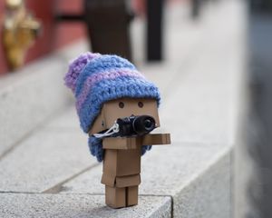 Preview wallpaper danbo, cardboard robot, photographer, camera, blur