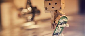 Preview wallpaper danbo, cardboard robot, skateboard, blur