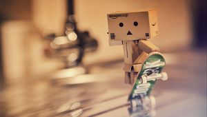 Preview wallpaper danbo, cardboard robot, skateboard, blur