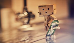 Preview wallpaper danbo, cardboard robot, skateboard, blur