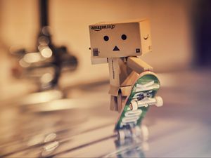 Preview wallpaper danbo, cardboard robot, skateboard, blur