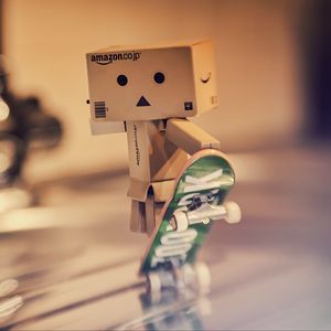 Preview wallpaper danbo, cardboard robot, skateboard, blur