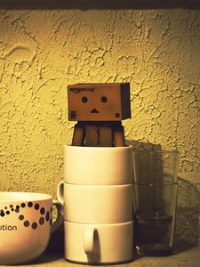 Preview wallpaper danboard, cardboard robot, cup, shadow