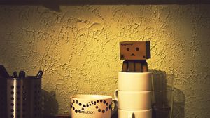 Preview wallpaper danboard, cardboard robot, cup, shadow