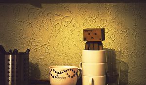 Preview wallpaper danboard, cardboard robot, cup, shadow