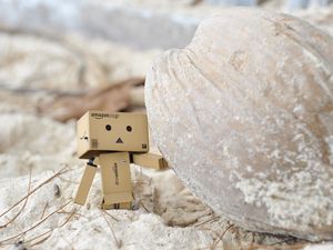 Preview wallpaper danboard, cardboard robot, sand, stone