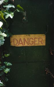 Preview wallpaper danger, words, inscription, plant