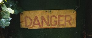 Preview wallpaper danger, words, inscription, plant