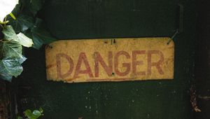 Preview wallpaper danger, words, inscription, plant