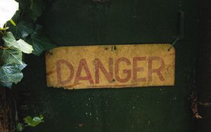 Preview wallpaper danger, words, inscription, plant