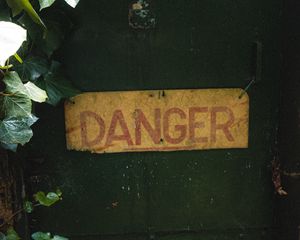 Preview wallpaper danger, words, inscription, plant