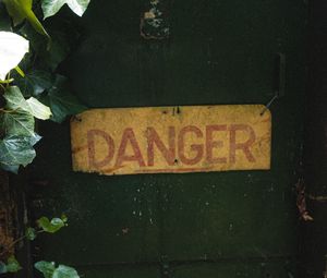 Preview wallpaper danger, words, inscription, plant