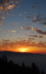 Preview wallpaper dawn, mountains, clouds, sun