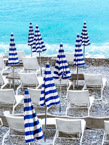 Preview wallpaper deck chairs, sunbeds, pebbles, sea, beach