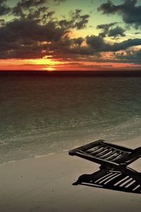 Preview wallpaper decline, beach, chair, shadow, sand, sun, sky