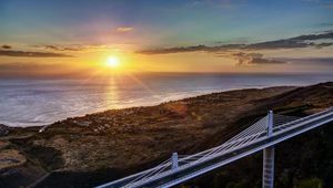 Preview wallpaper decline, coast, bridge, sky, ocean, horizon