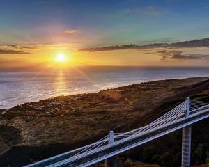 Preview wallpaper decline, coast, bridge, sky, ocean, horizon