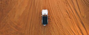 Preview wallpaper desert, car, aerial view, sand, traces, off-road