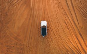 Preview wallpaper desert, car, aerial view, sand, traces, off-road