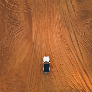 Preview wallpaper desert, car, aerial view, sand, traces, off-road