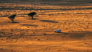 Preview wallpaper desert, car, aerial view, sand, nature