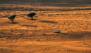 Preview wallpaper desert, car, aerial view, sand, nature