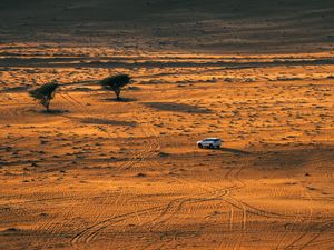 Preview wallpaper desert, car, aerial view, sand, nature