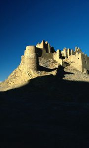 Preview wallpaper desert, castle, shade, sand, evening