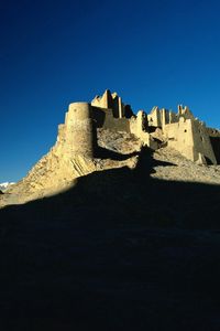 Preview wallpaper desert, castle, shade, sand, evening