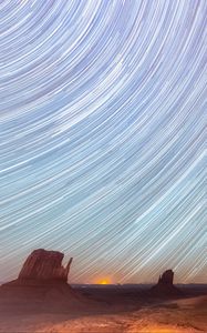 Preview wallpaper desert, cliffs, starry sky, blur, long exposure