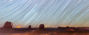 Preview wallpaper desert, cliffs, starry sky, blur, long exposure