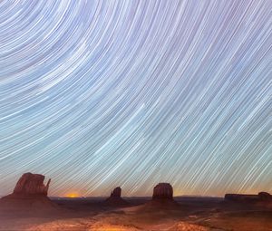 Preview wallpaper desert, cliffs, starry sky, blur, long exposure