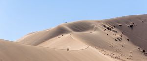 Preview wallpaper desert, hills, sand, silhouettes, travelers