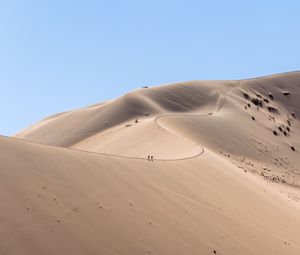 Preview wallpaper desert, hills, sand, silhouettes, travelers