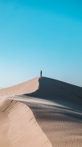 Preview wallpaper desert, man, alone, hill, sand