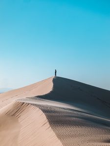 Preview wallpaper desert, man, alone, hill, sand