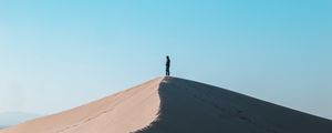 Preview wallpaper desert, man, alone, hill, sand