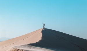 Preview wallpaper desert, man, alone, hill, sand