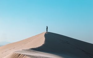 Preview wallpaper desert, man, alone, hill, sand