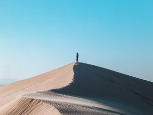 Preview wallpaper desert, man, alone, hill, sand