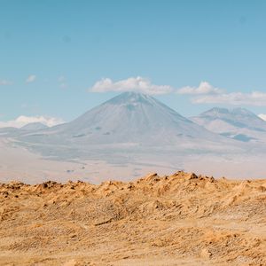 Preview wallpaper desert, mountains, volcano, clouds, landscape
